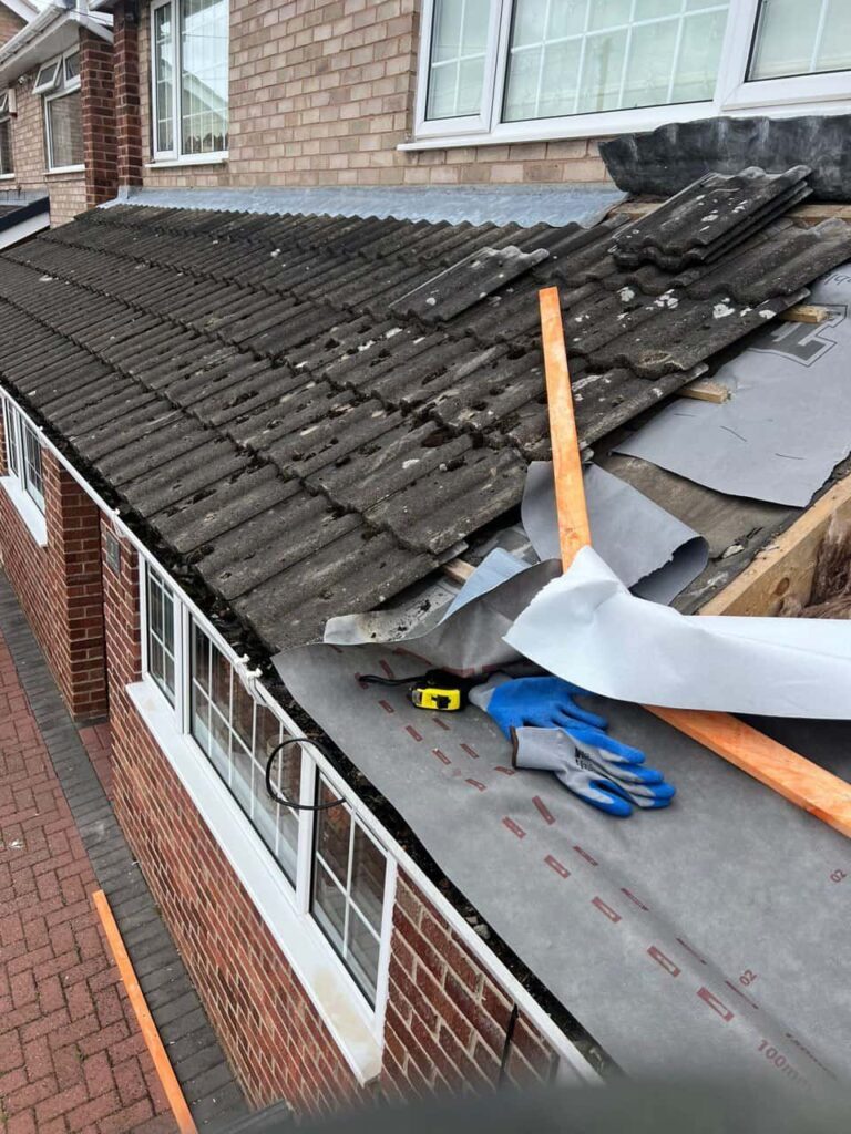 Roof tile repair on a UK home