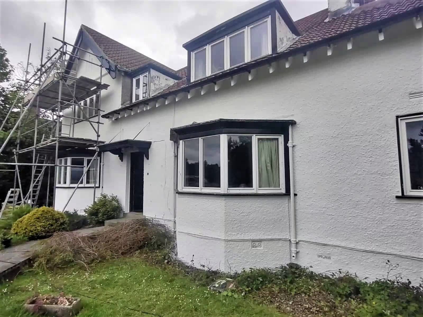 UK house with freshly painted masonry
