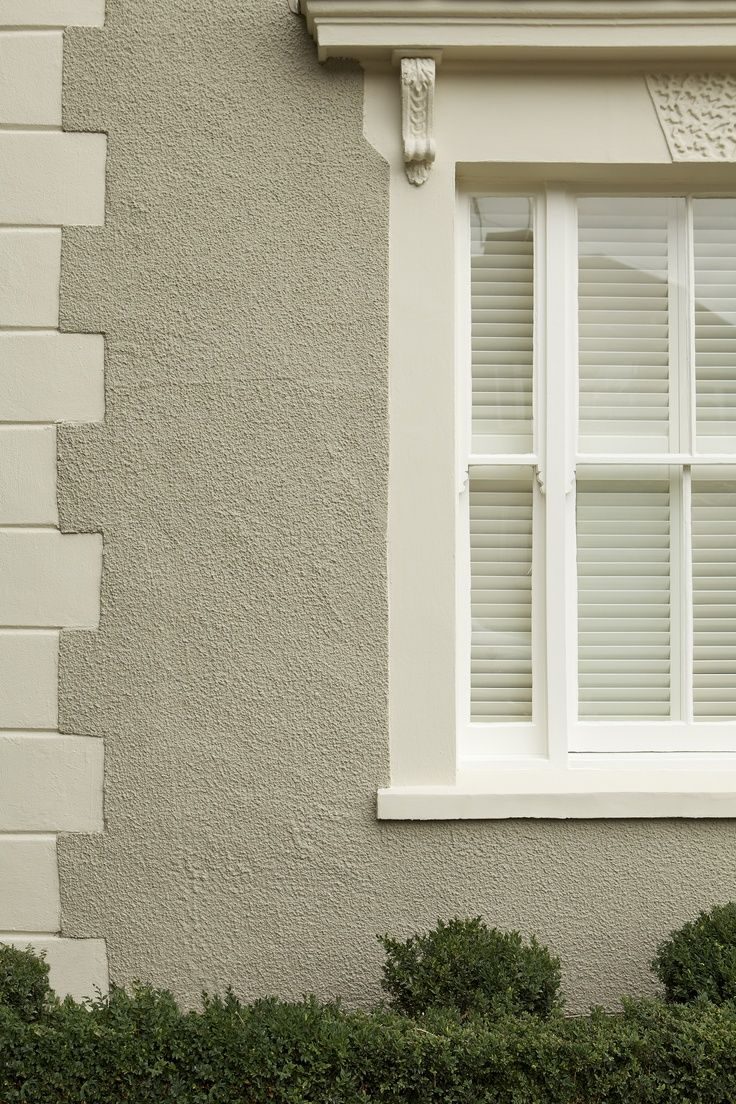 Painted pebbledash semi-detached UK house