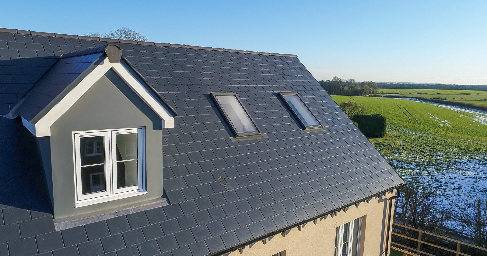 Natural slate pitched roof on a UK house