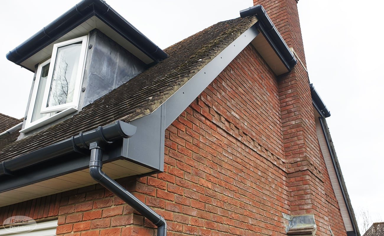 Anthracite uPVC fascia with white soffit on a UK house