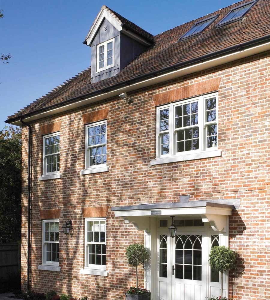 White uPVC sash windows on a UK property